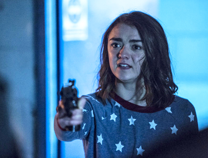 Maisie Williams with a gun.